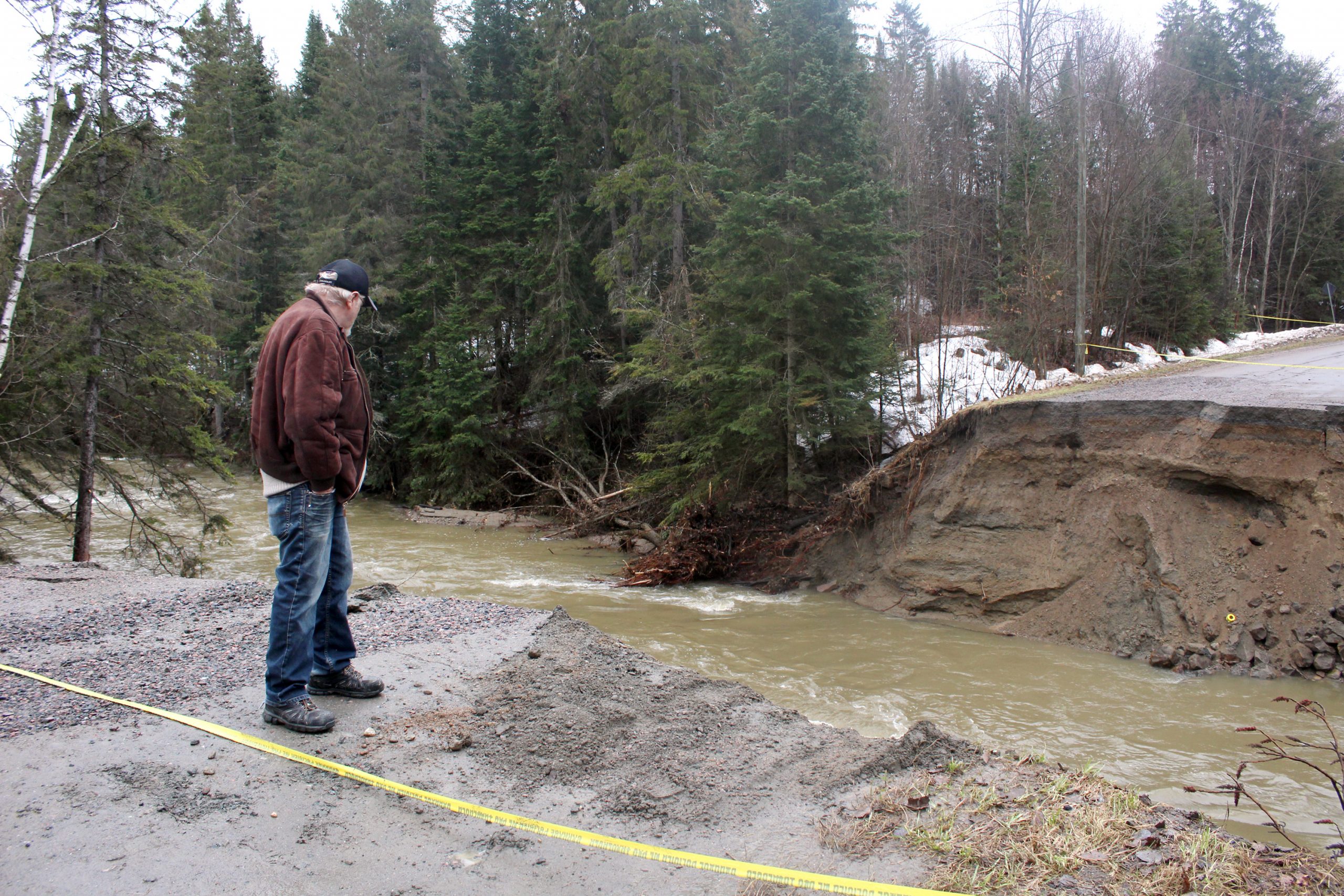 The scene of the Bronson-Bryant washout that claimed the life of Louise Lortie Séguin. She died as a result of drowning when her car fell into the deep crevasse, which had formed after a culvert was washed out.
