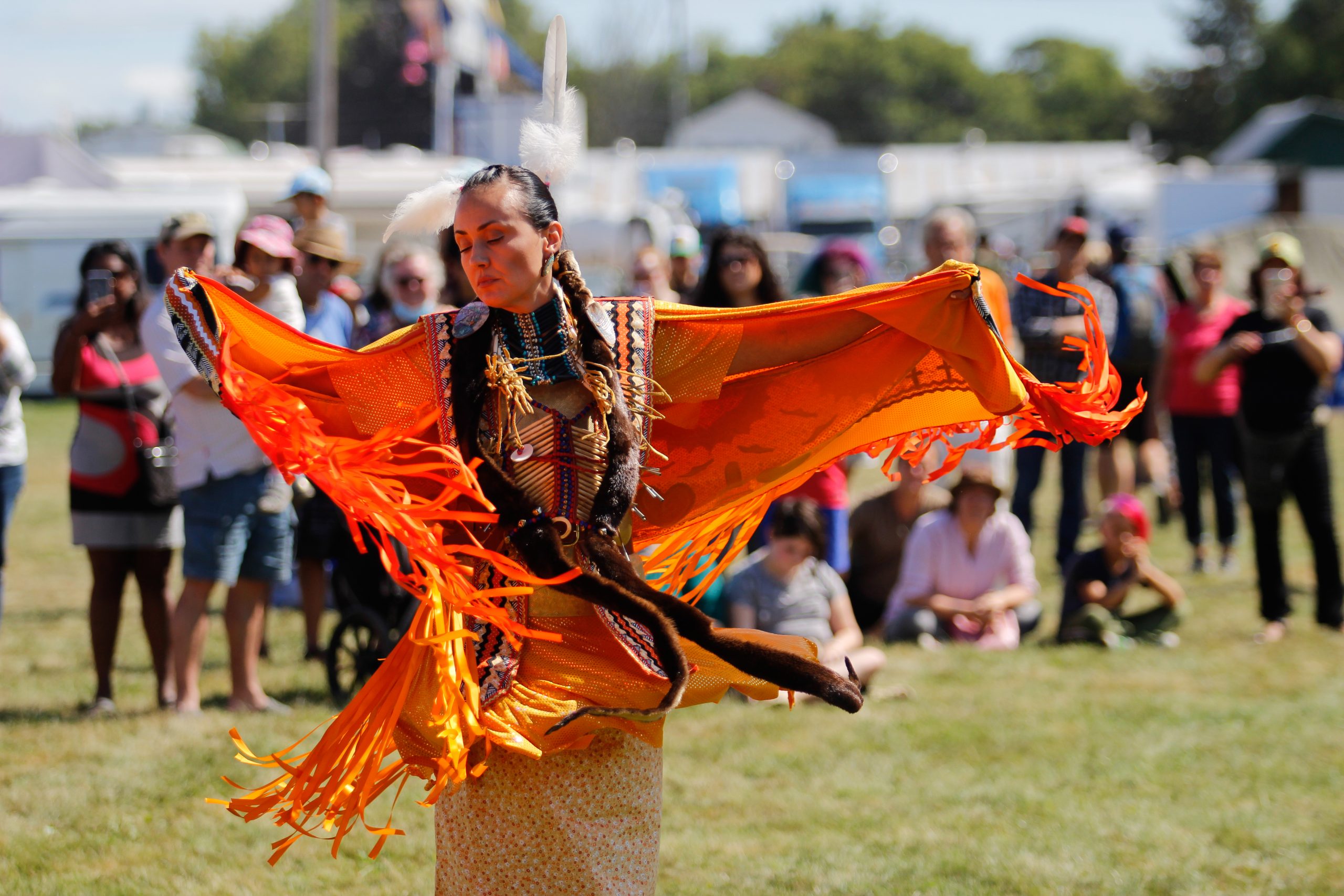 Josée of Pikwàkanagàn First Nation performs the Fancy Shall dance, which emulates the butterfly