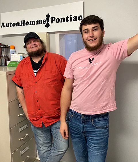 Pictured from left to right are Mario Hérault who works at the Autonhomme housing center, and community worker Gabriel Lemaire.