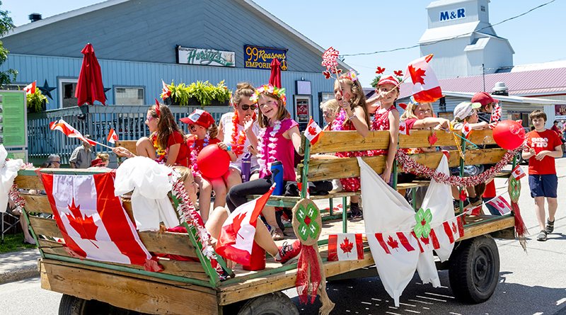 Members of the Shawville 4-H Club were all smiles while participating in the Canada Day parade.
